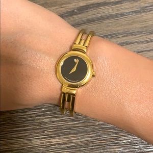 Women’s Gold Movado bangle watch